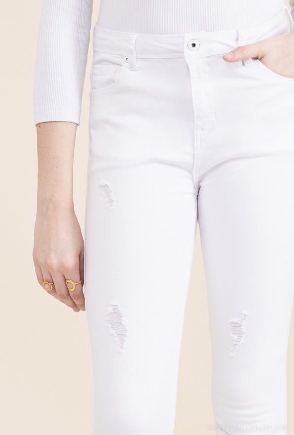 detail Dámské džíny, trhané nohavice